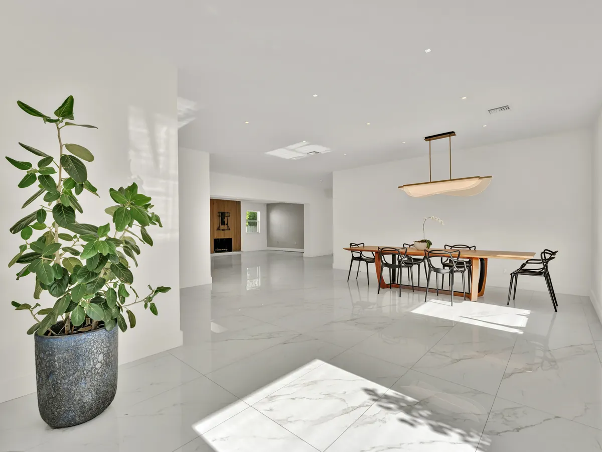 Open-plan living and dining room with ten-foot ceilings